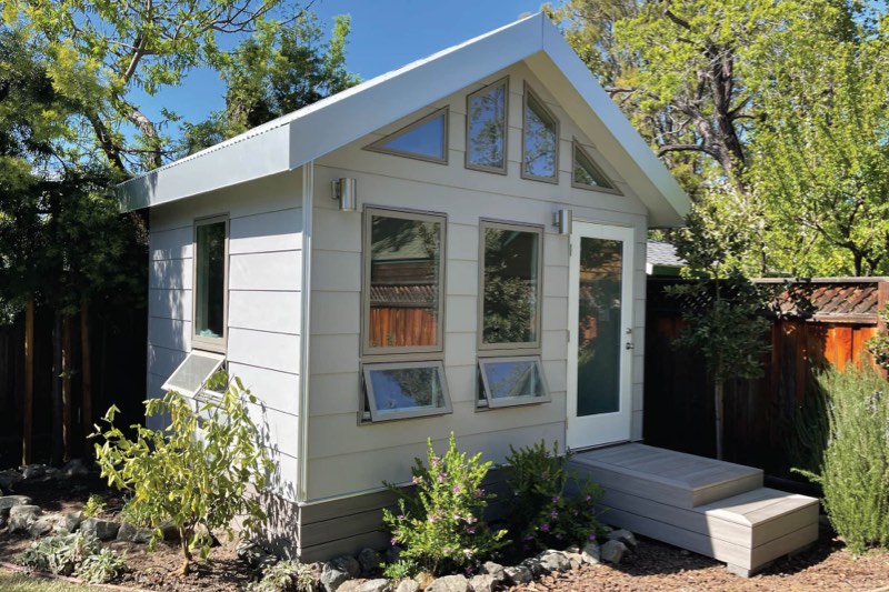 Studio Shed Portland series with cedar plank siding and black doors