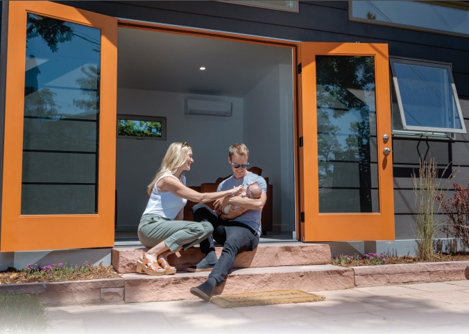 A family enjoying their Studio Shed ADU tiny home