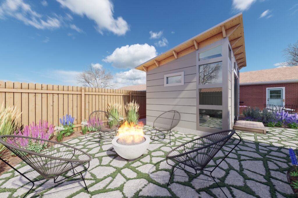 shed landscaping with lawn and stone and a garden in a back corner